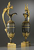 An extremely fine pair of Empire gilt and patinated bronze ewers attributed to Claude Galle